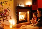Baby proof fireplace: A family cuddling in front of a warm fire
