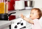 Baby reaching for pan: Childproofing your kitchen